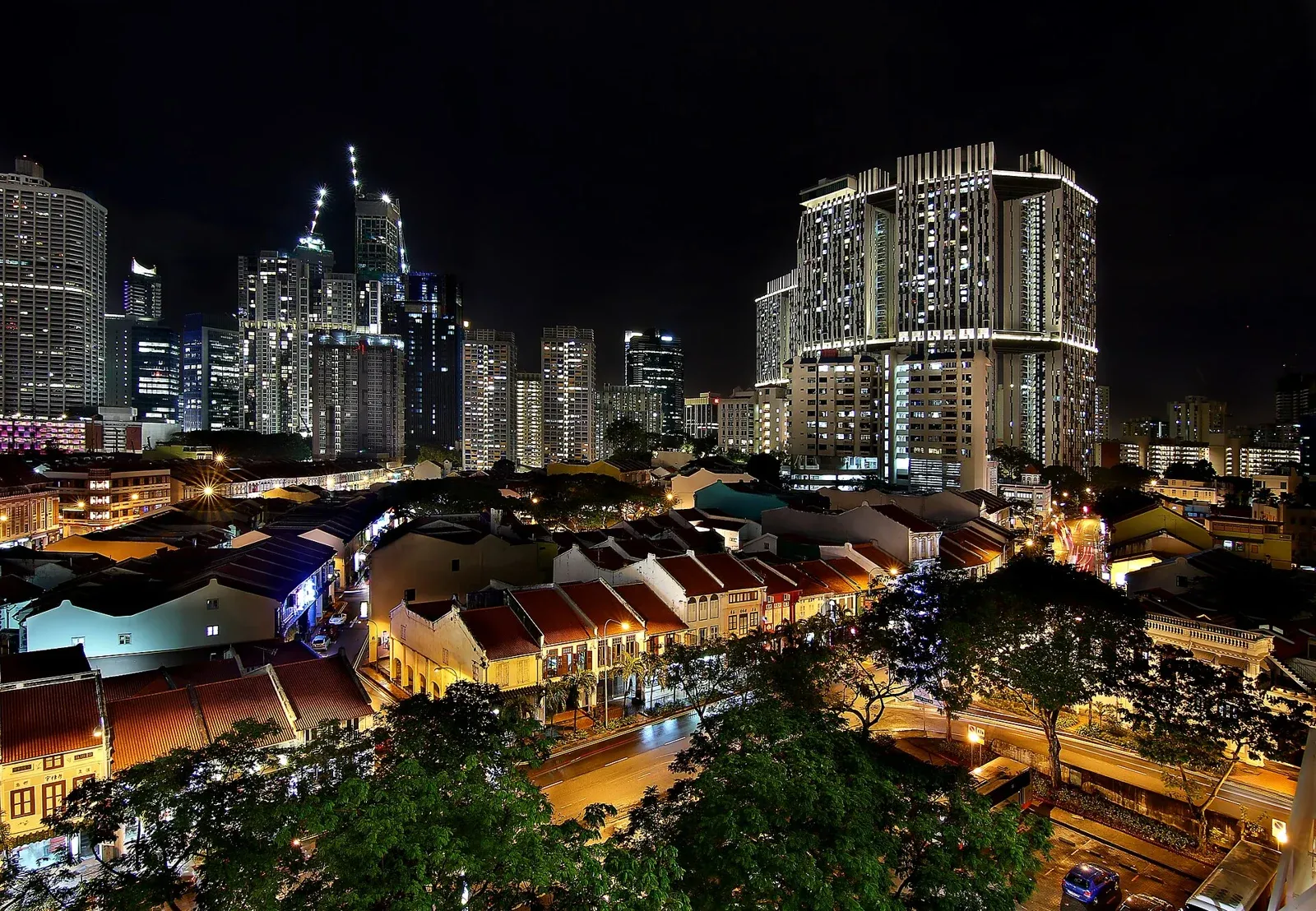 Singapore's illuminated cityscape and housing at night